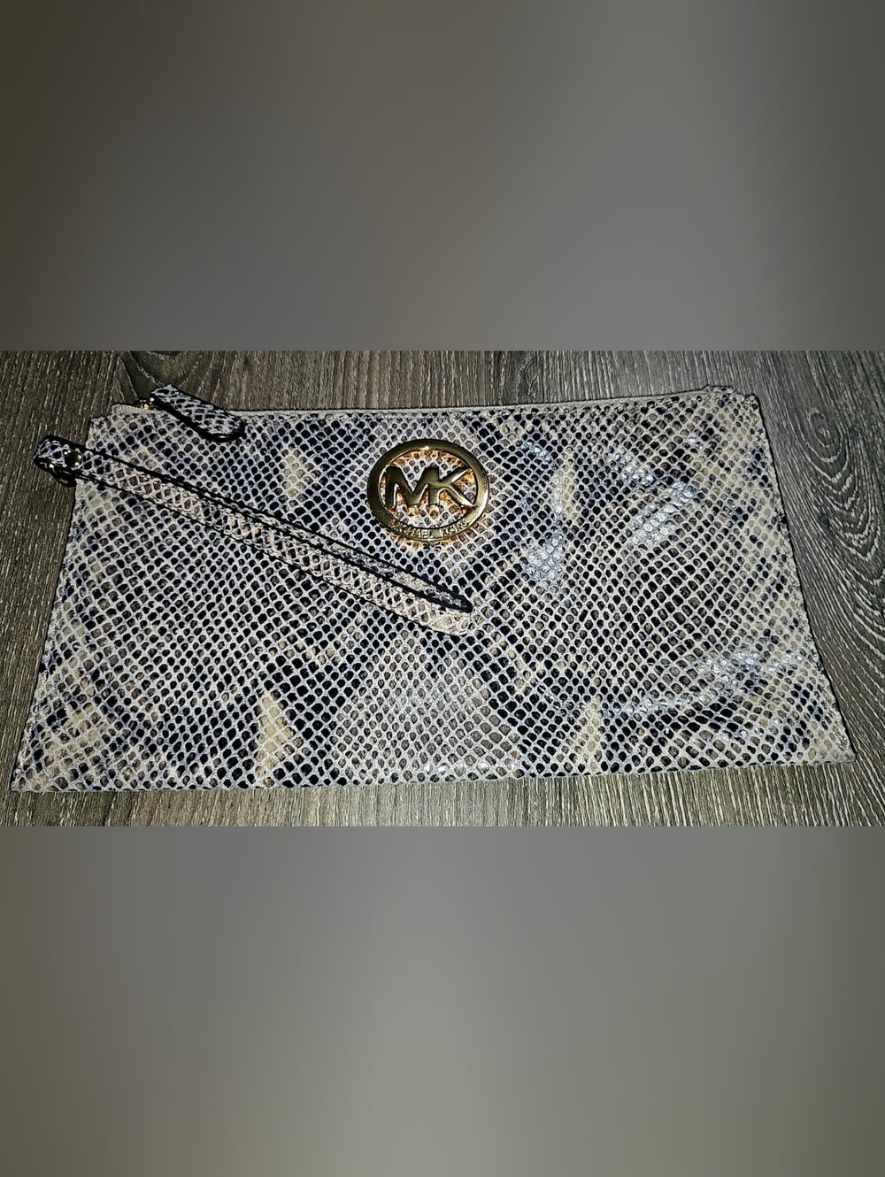 Authentic Michael Kors Snakeskin Large Wristlet Wallet with gold logo